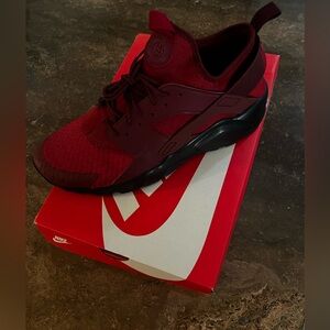 Size 12 Nike Huraches Run Ultra . New never worn. Darker red